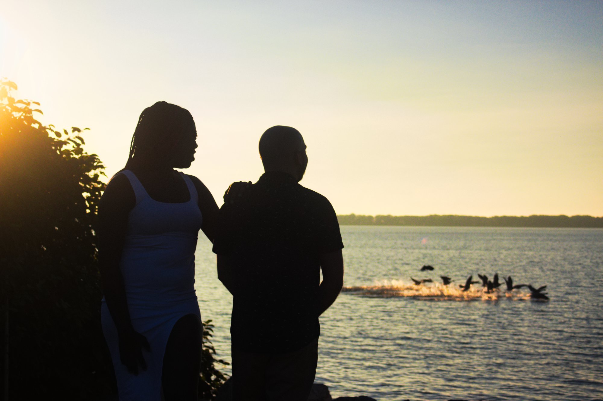 Silhouette by water